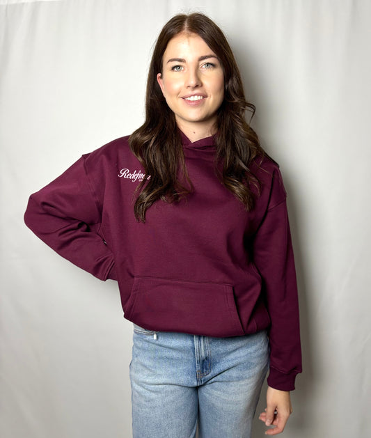 Bordeaux hoodie voor dames van Myjewellen: een comfortabele, zachte bordeauxrode sweater met een trendy relaxed fit.