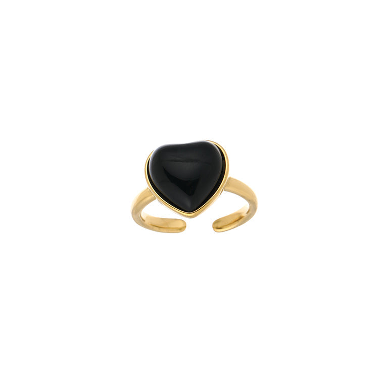 Gedetailleerde productfoto van de verstelbare goud/zwarte hartjes ring van roestvrij staal.